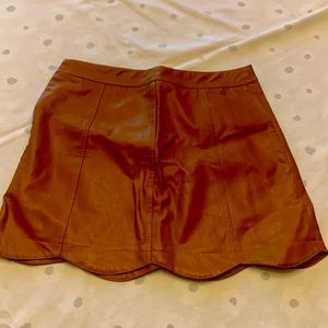 Tan leather mini skirt